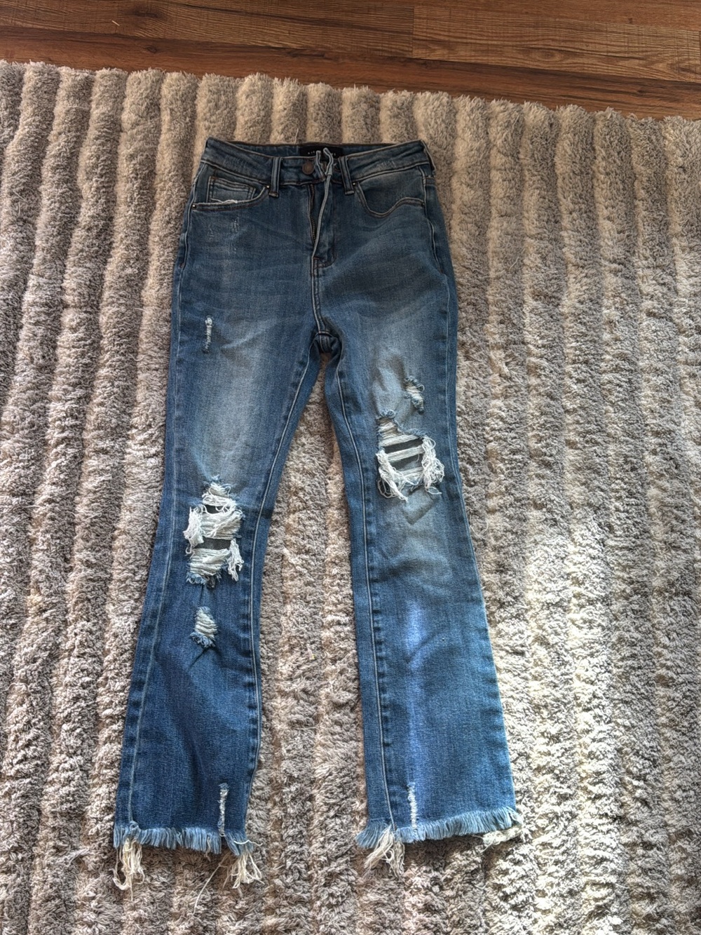 Distressed Women’s Blue Denim Jeans - Classic Ripped Style